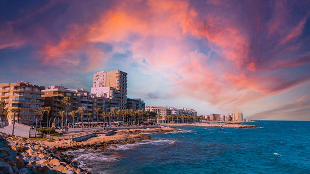 Sunset over the sea in Torrevieja on the Costa Blanca, perfect for a romantic couples weekend